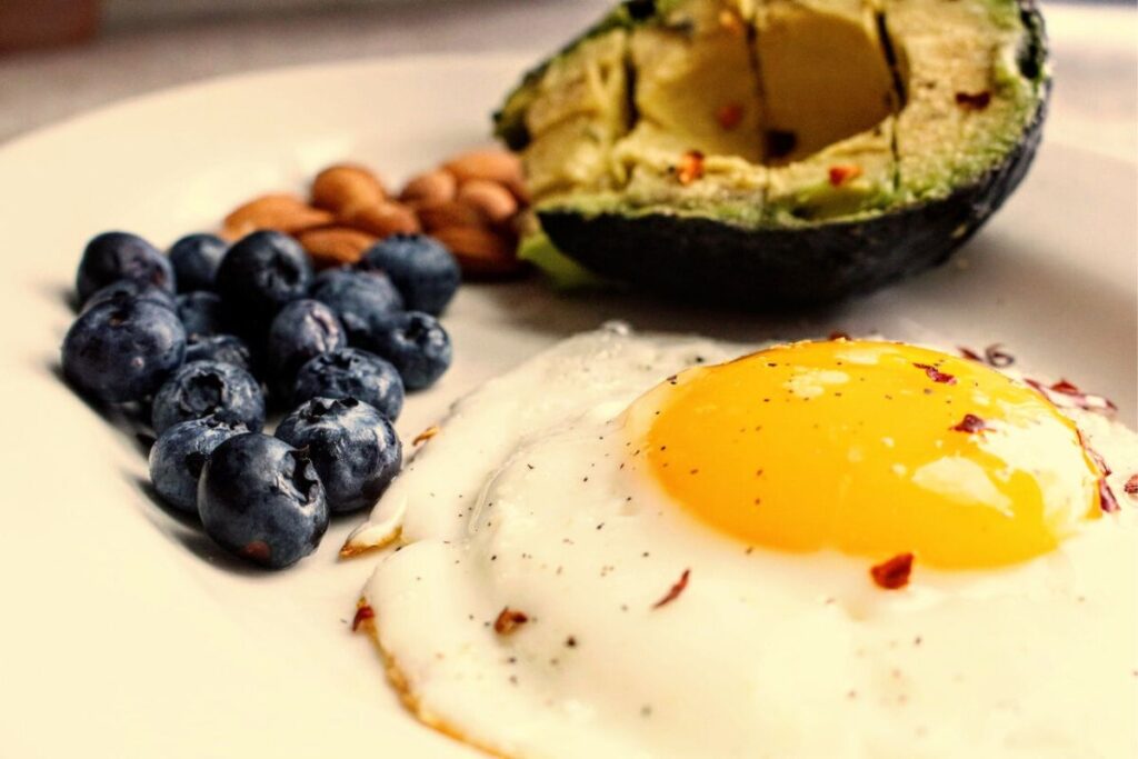 Omelet with blueberries and freshevacado
